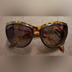 Alexander McQueen tortoise and black frame sunglasses